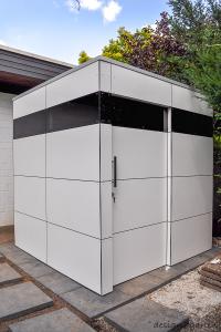 Harmonisches Doppel: Quadratische Gartenlaube in guter Nachbarschaft