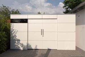 Customised space solution: stylish garden shed made from HPL