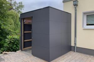 Custom-made HPL garden shed: smart space solution with walk-through function