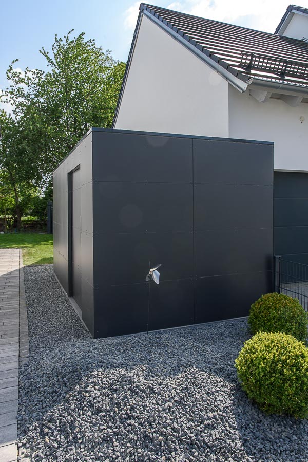 Transformation im Außenbereich: Der moderne Design–Geräteschuppen aus HPL