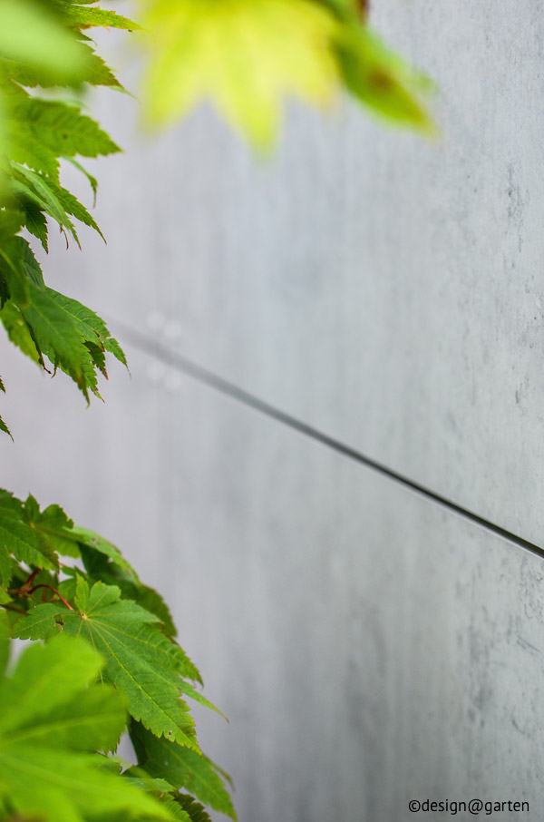 Zeitloser Minimalismus: Das moderne Gartenhaus in edler Beton-Optik