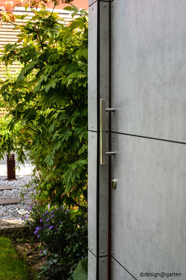 Zeitloser Minimalismus: Das moderne Gartenhaus in edler Beton-Optik