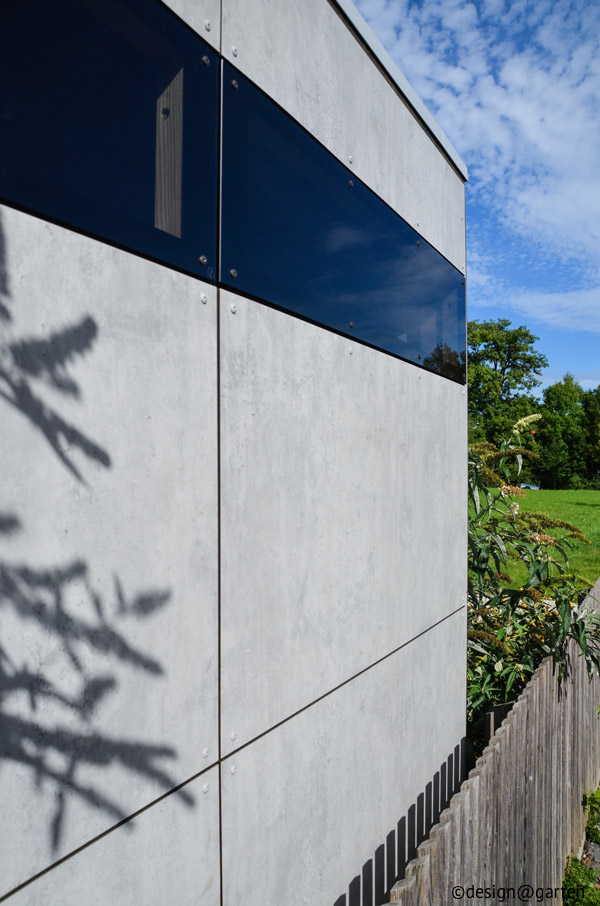 Zeitloser Minimalismus: Das moderne Gartenhaus in edler Beton-Optik