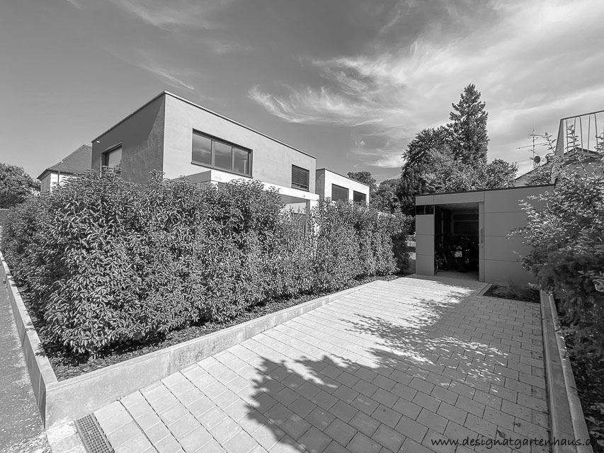 Minimalistischer Gartenschuppen mit Flachdach – Architektur trifft Stauraum