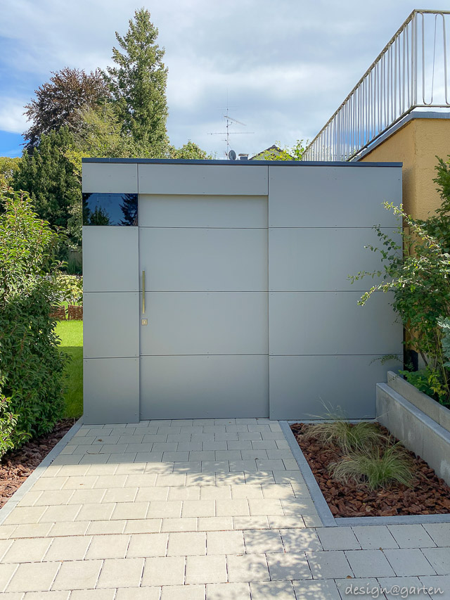 Minimalistischer Gartenschuppen mit Flachdach – Architektur trifft Stauraum