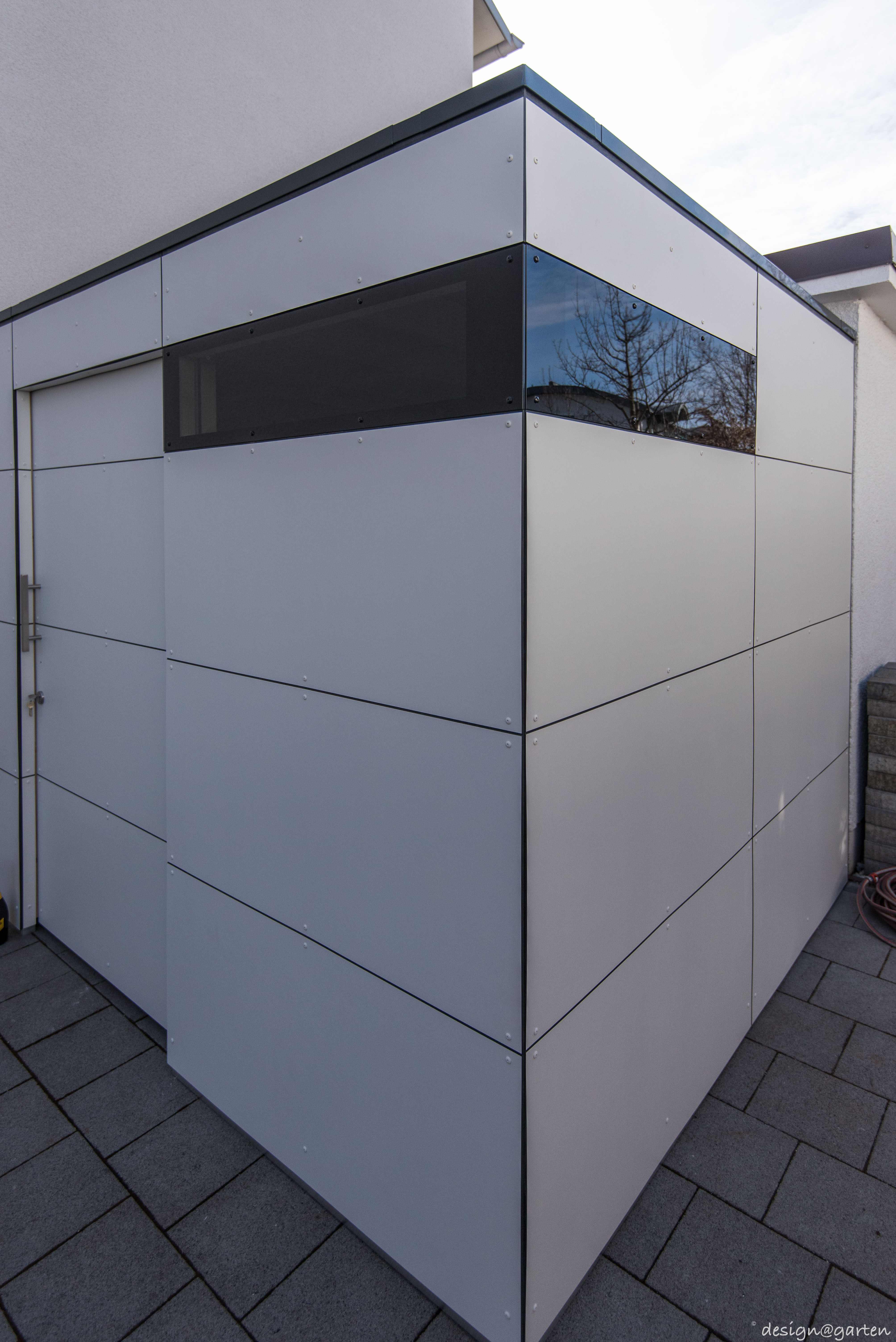 Modernes Gartenhaus: Stimmiges Gesamtkonzept für Haus und Garten