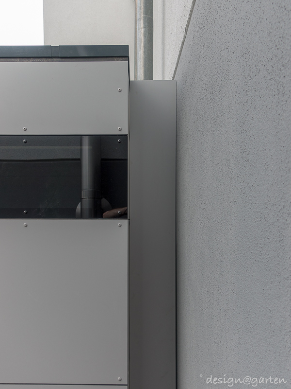 Harmonious integration: equipment shed with flat roof