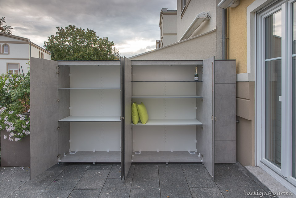 Smart space saver: wide tall cabinet for the terrace with a system