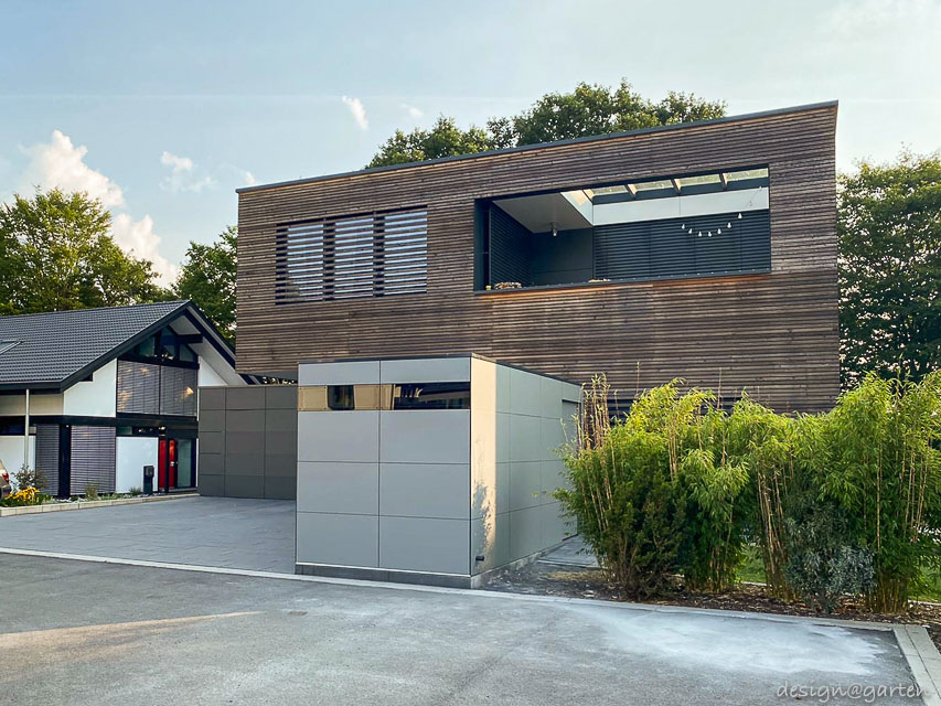 Architect-designed garden shed with flat roof as a modern storage solution in the Frankfurt area