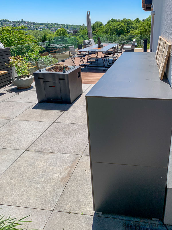 Smart water integration and material durability: custom-made sideboard for the modern patio