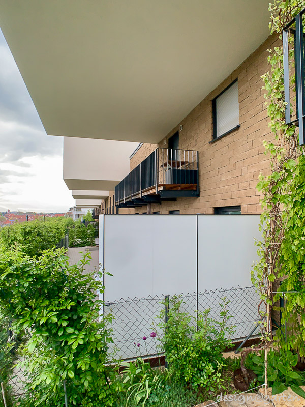 Customised weatherproof tall cabinet: elegant volume and functional terrace design