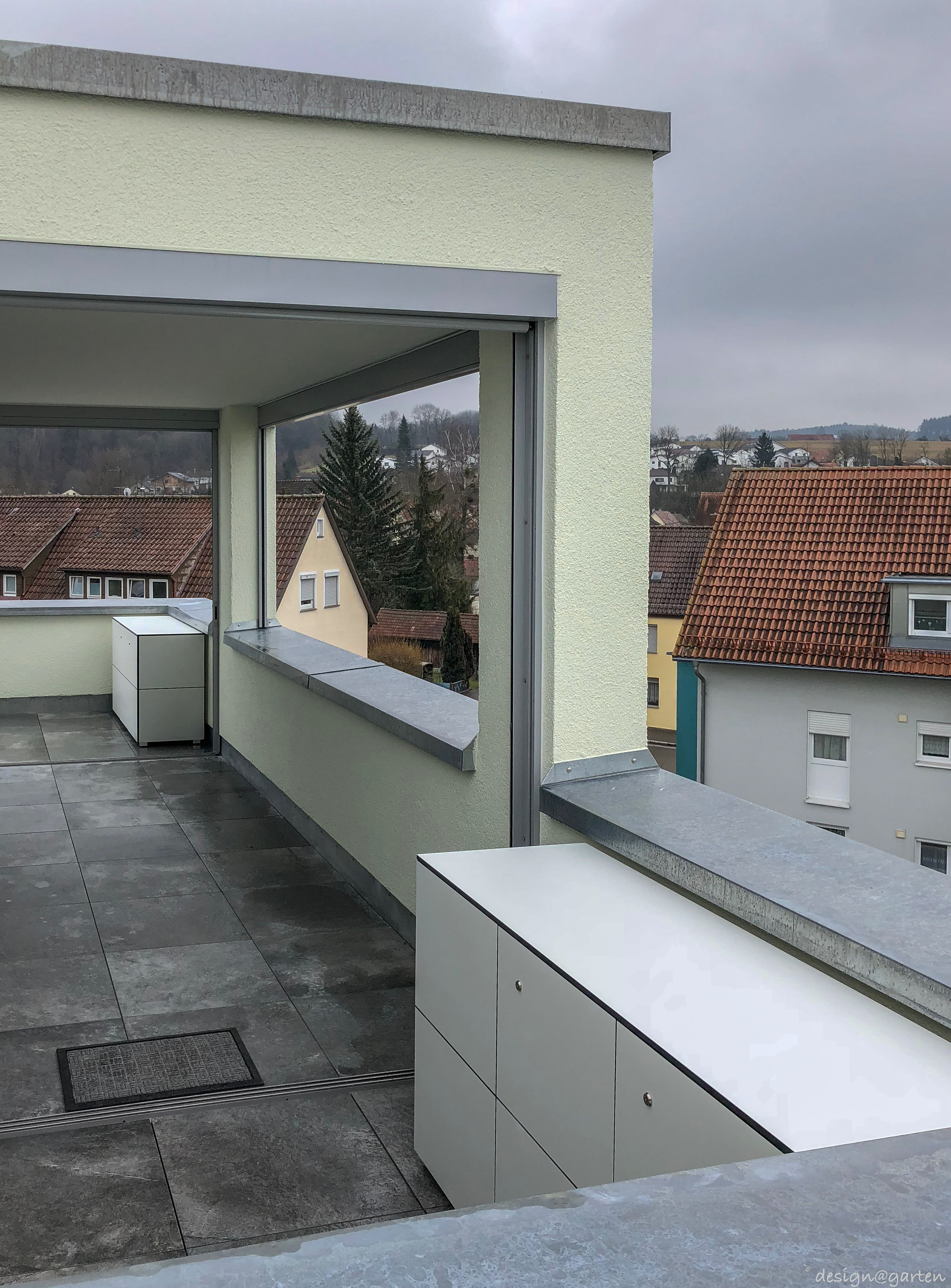 Lockable designer sideboards on an exposed roof terrace in Baienfurt