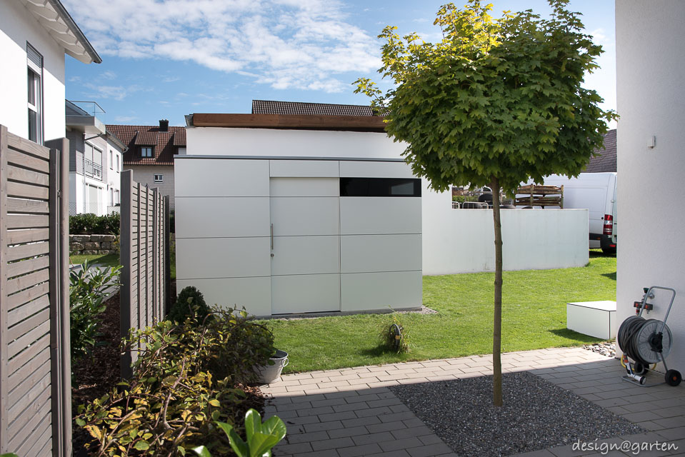 White designer garden shed with corner glazing in Friedrichshafen