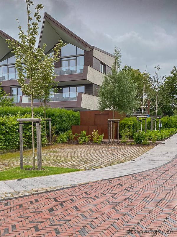 Triple waste bin enclosure in Corten steel look in Wyk auf Föhr