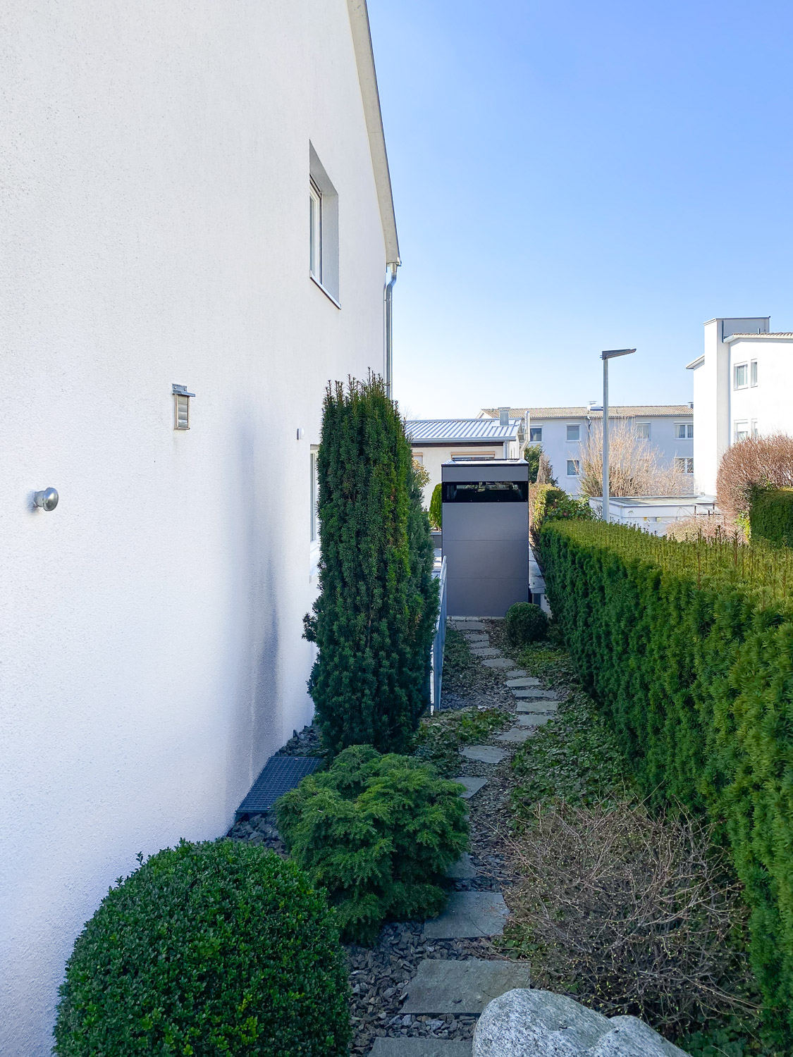 Narrow garden shed on the terrace