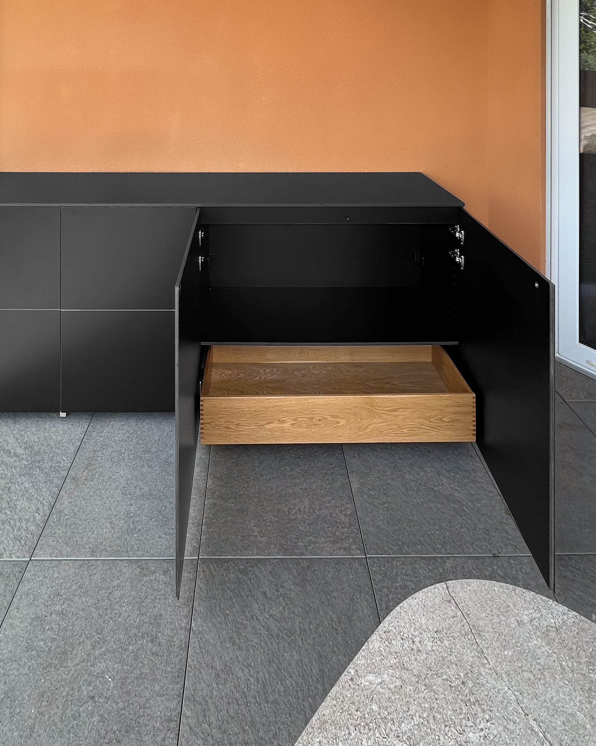 Black XL garden cabinet – weatherproof and with oak drawer