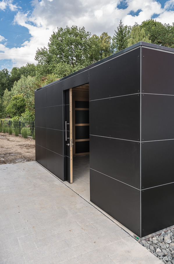 A modern architect-designed garden shed as a black box