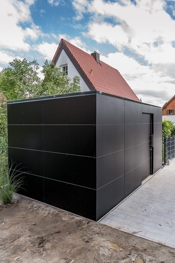 A modern architect-designed garden shed as a black box