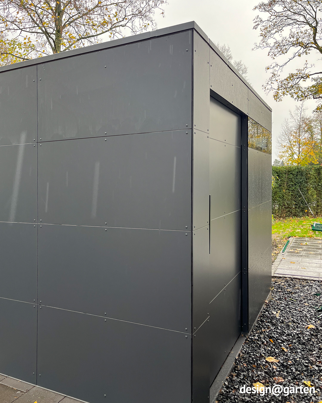 HPL garden shed in rainy weather