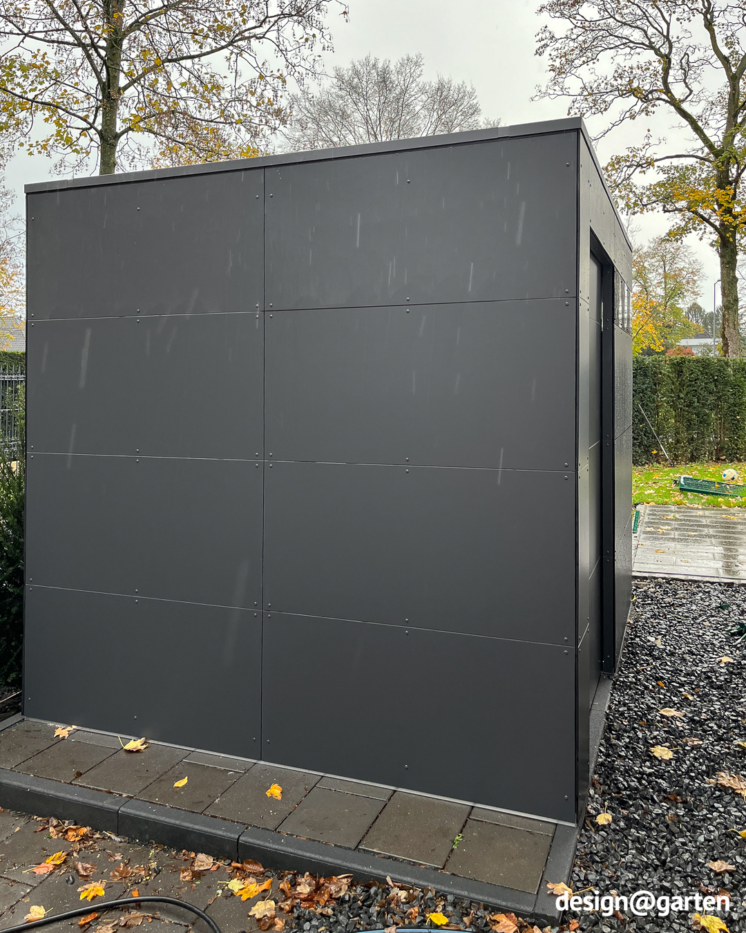 HPL garden shed in rainy weather