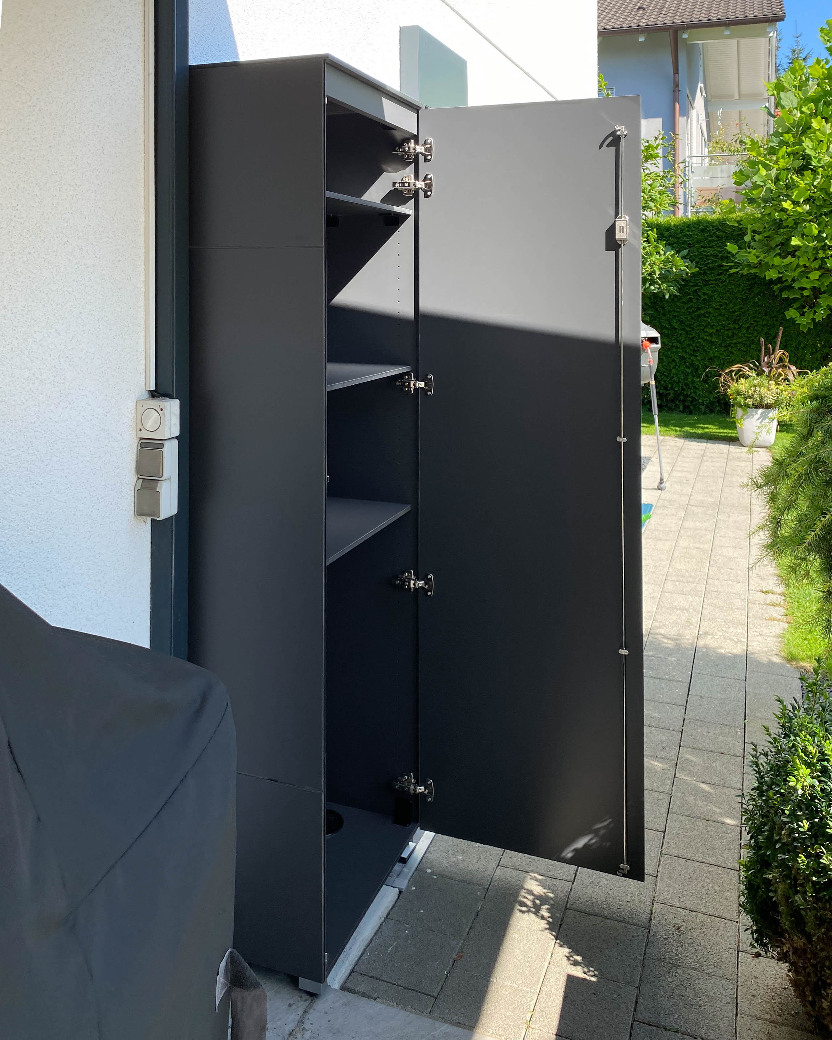 Narrow garden cabinet with ample storage space