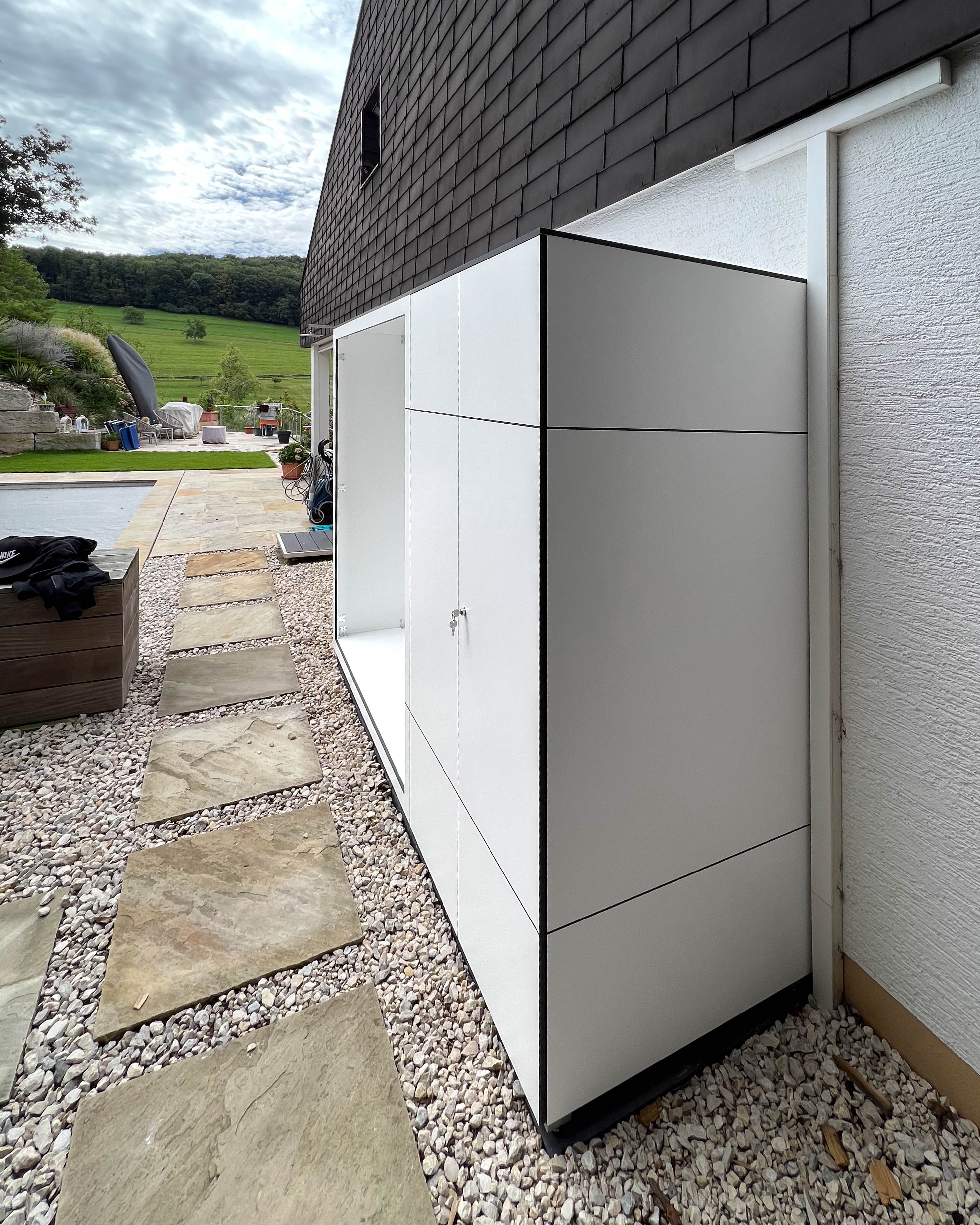 Wood storage with adjoining storage space