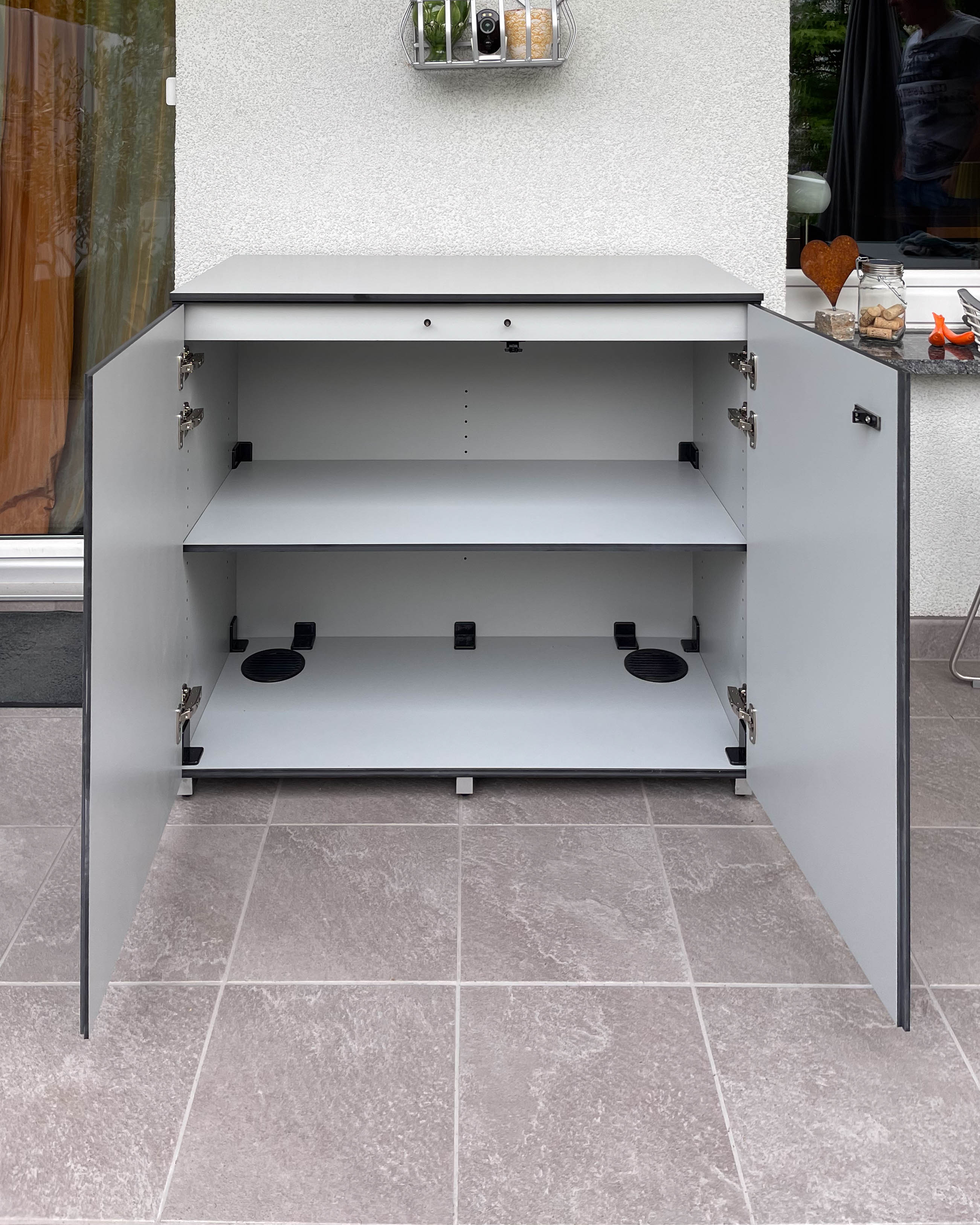 Silver-grey outdoor sideboard made of HPL