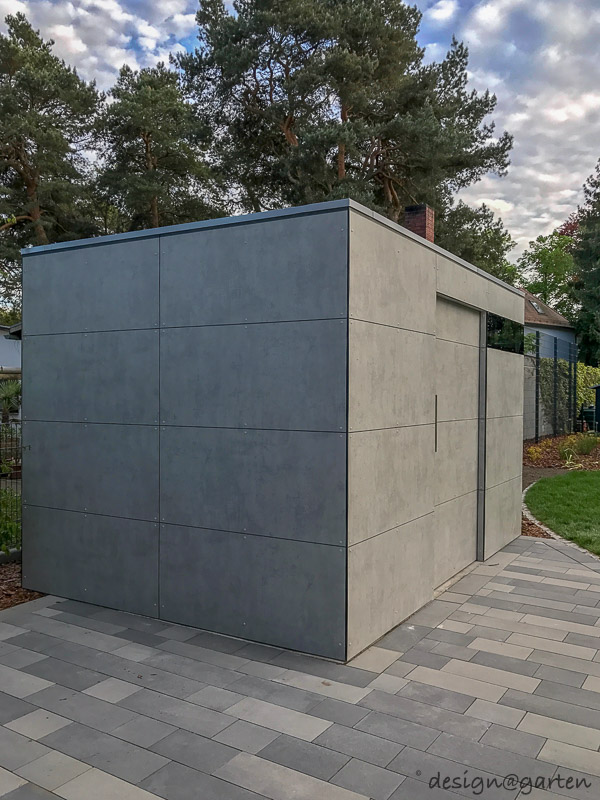 Toques modernos con aspecto de hormigón visto: la caseta de jardín Cube.