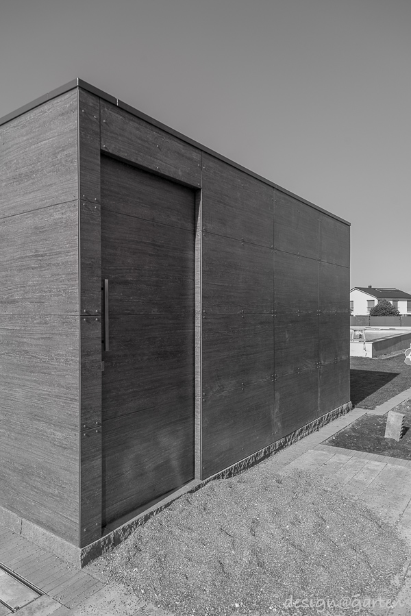 Protección visual multifuncional: moderna caseta de jardín en esquina