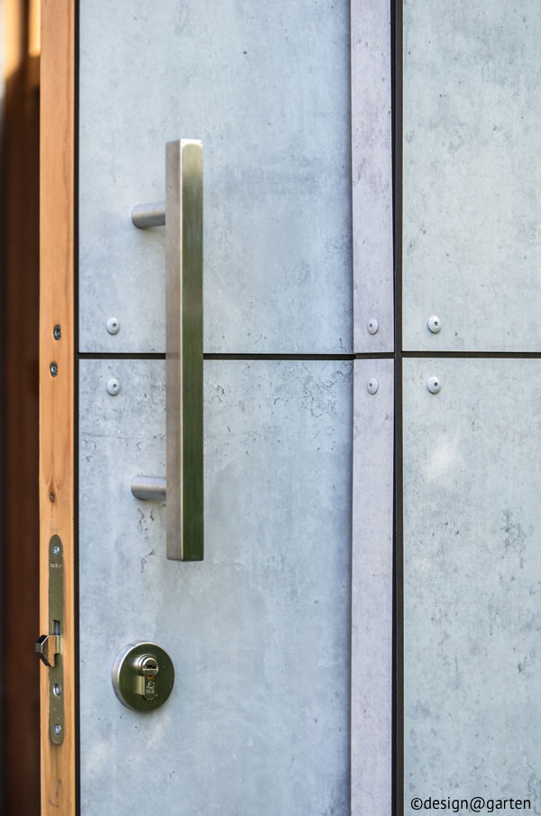 Minimalismo atemporal: la moderna caseta de jardín con un elegante acabado de hormigón.