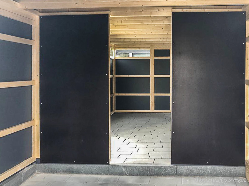 Trabajo de precisión en pendiente: espacio de jardín a medida con compensación de nivel integrada