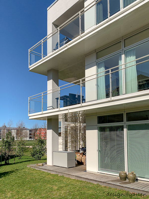 Solution de rangement à Copenhague : armoires de terrasse résistantes aux intempéries pour les coussins
