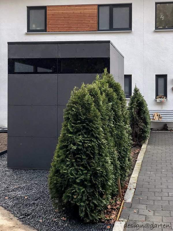 Conception sur mesure et matériaux de la plus haute qualité pour cette maison de jardin moderne