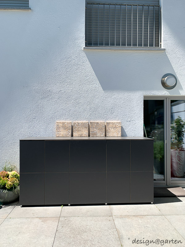 Intégration intelligente de l'eau et résistance des matériaux : buffet sur mesure pour terrasse moderne