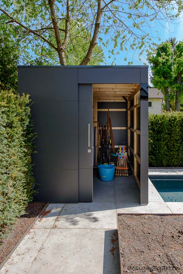 Il fiore all'occhiello architettonico nel giardino dei sogni: la casetta da giardino di design