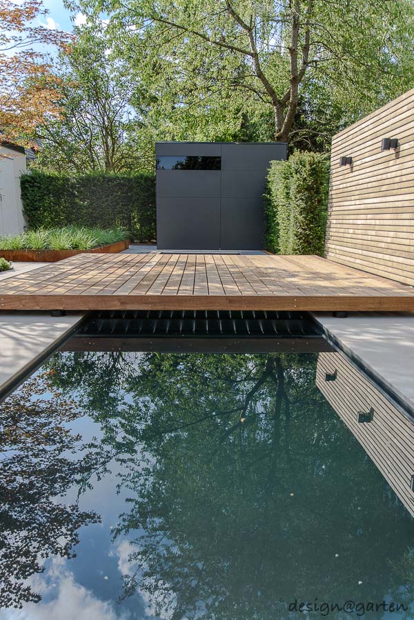 Il fiore all'occhiello architettonico nel giardino dei sogni: la casetta da giardino di design