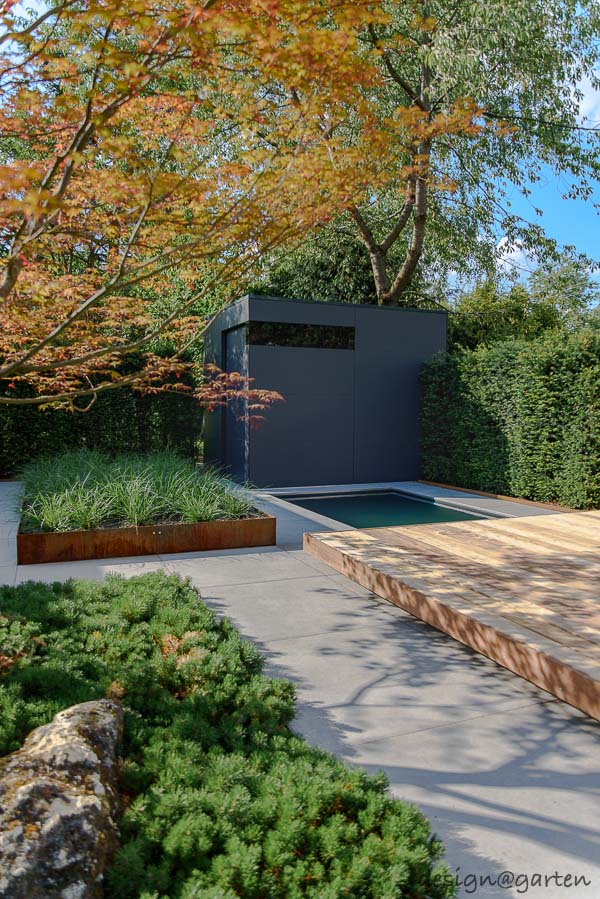 Il fiore all'occhiello architettonico nel giardino dei sogni: la casetta da giardino di design