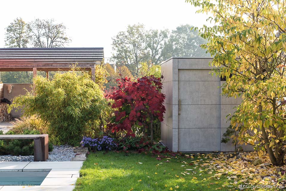 Minimalismo senza tempo: la moderna casetta da giardino dall'elegante effetto cemento